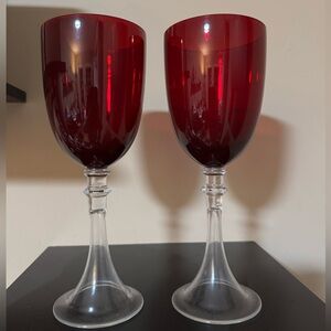 Pair of cranberry wine goblet made by the Morgantown Glass Company.